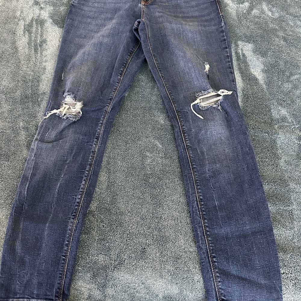 Woman’s Distressed Old Navy RockStar Super Skinny MidRise Size 12 Blue Jeans